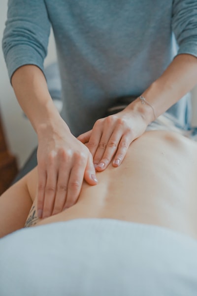 Woman is being massaged by the professional therapist