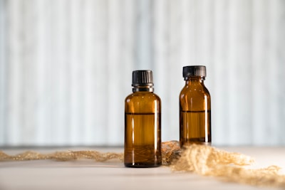 Two vials with oil extracts for massaging